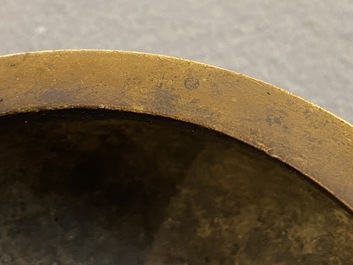 A Chinese bronze tripod censer, Xuande mark, 18th C.