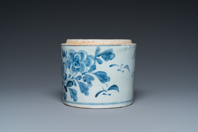 A Korean blue and white jar with floral design and calligraphy, Joseon, 18th C.