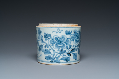 A Korean blue and white jar with floral design and calligraphy, Joseon, 18th C.