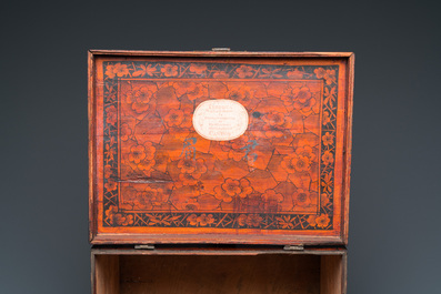 A Chinese wooden chest with a Tingqua store label, Canton, 19th C.