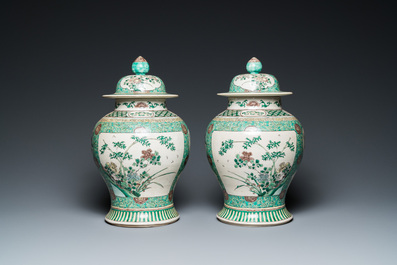 A pair of Chinese verte biscuit vases and covers, 19th C.