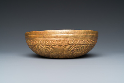 An Ottoman 'tombak' gilt-copper hammam bowl or 't&acirc;s', Turkey, 18/19th C.