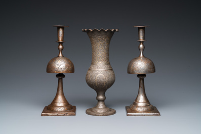 Une paire de bougeoirs et un vase en acier damascen&eacute;, art qadjar, la Perse, 19&egrave;me