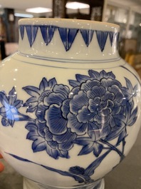 A Chinese blue and white vase with birds among blossoming branches, Transitional period