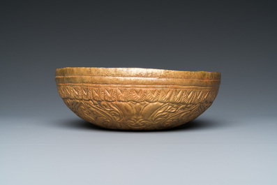 An Ottoman 'tombak' gilt-copper hammam bowl or 't&acirc;s', Turkey, 18/19th C.