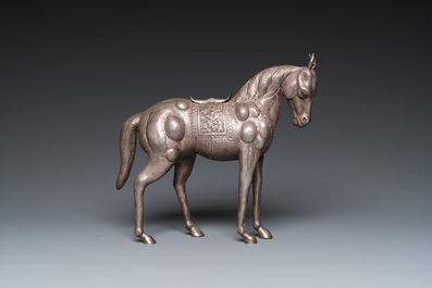 A Chinese silver model of a horse and a pair of bracelets, 19/20th C.