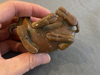 A Chinese bronze 'boy on buffalo' water dropper, Qing