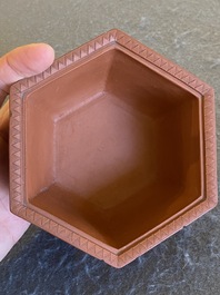 A Chinese Yixing stoneware reticulated hexagonal bowl and cover, Kangxi