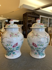 A pair of fine Chinese famille rose vases and covers, 19th C.