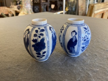 A pair of Chinese blue and white small vases with ladies, Kangxi