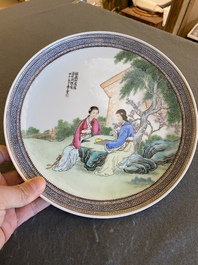 A Chinese famille rose dish with ladies playing go, signed Wanglong Fu 王隆夫, dated 1954