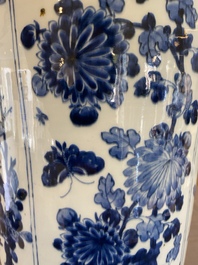 A large Chinese blue and white rouleau vase with floral design, Kangxi
