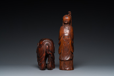 A Chinese carved bamboo statue of an elephant and one of Shou Lao, 19/20th C.