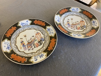 A pair of Chinese famille rose plates with a lady doing her make-up, Yongzheng