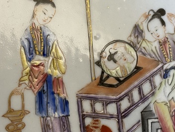 A pair of Chinese famille rose plates with a lady doing her make-up, Yongzheng