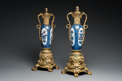 A pair of Chinese powder-blue vases with gilt bronze lamp mounts, Kangxi and 19th C.