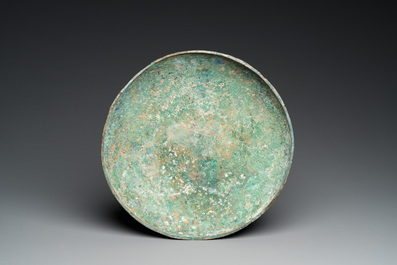 A very large archaic bronze tripod vessel and cover, 'ding', Eastern Zhou period