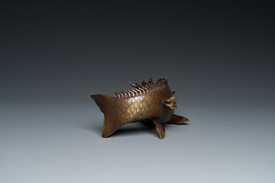 A Chinese bronze dragonfish form censer, Ming