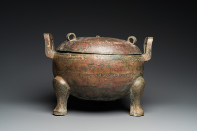 A very large archaic bronze tripod vessel and cover, 'ding', Eastern Zhou period