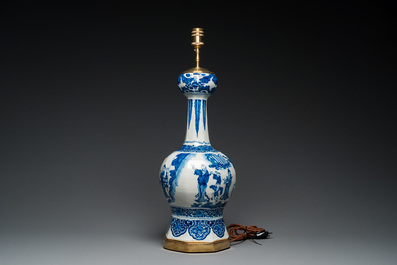 A large Dutch Delft blue and white chinoiserie vase mounted as a lamp, 1st quarter 18th C.