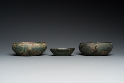 Three Chinese elliptical bronze cups, Eastern Zhou and Han