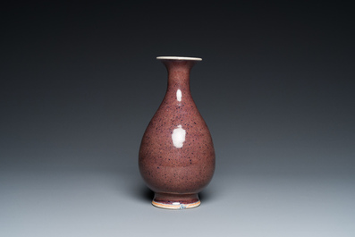 A Chinese speckled liver-red 'yuhuchunping' vase, 19th C.