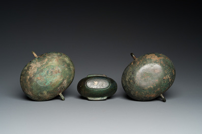 Three Chinese elliptical bronze cups, Eastern Zhou and Han