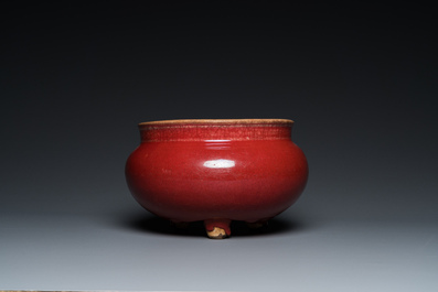 A Chinese sang-de-boeuf-glazed tripod censer, 18/19th C.