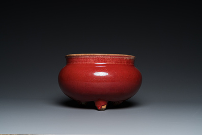 A Chinese sang-de-boeuf-glazed tripod censer, 18/19th C.