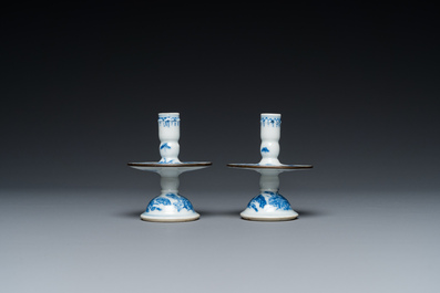 A pair of Chinese blue and white 'Bleu de Hue' candlesticks for the Vietnamese market, Kim Ngoc Cam Kee 金玉錦記 mark, 19th C.