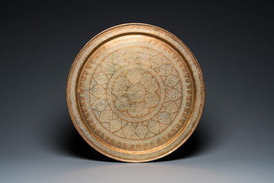 Two large Islamic Mamluk-style brass dishes, Egypt or Syria, 19th C.