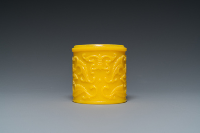 A Chinese yellow Peking glass chamfered dish and a cylindrical container, Qing/Republic