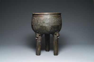 A large Chinese tripod censer on wooden base and display stand, Qing