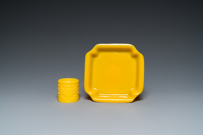 A Chinese yellow Peking glass chamfered dish and a cylindrical container, Qing/Republic