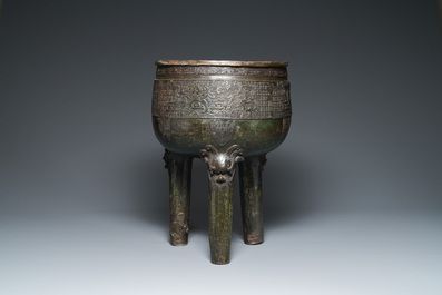 A large Chinese tripod censer on wooden base and display stand, Qing