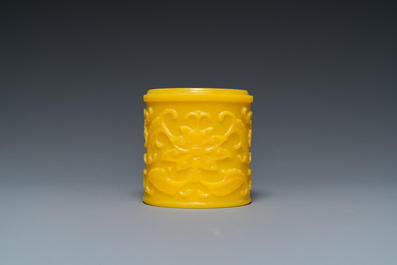 A Chinese yellow Peking glass chamfered dish and a cylindrical container, Qing/Republic