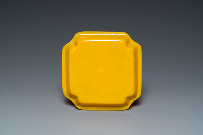 A Chinese yellow Peking glass chamfered dish and a cylindrical container, Qing/Republic