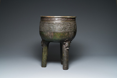 A large Chinese tripod censer on wooden base and display stand, Qing