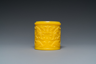 A Chinese yellow Peking glass chamfered dish and a cylindrical container, Qing/Republic