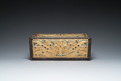 Alfred Daguet (Paris, 1875-1942): A Gothic revival repouss&eacute; brass and copper-mounted metal box with glass cabochons, ca. 1900