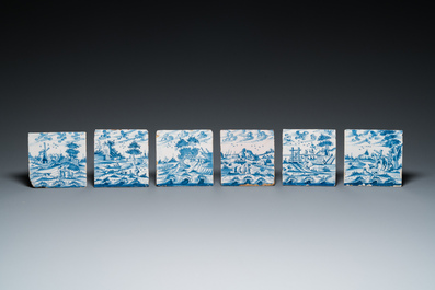 12 blauw-witte Delftse tegels met 'openlucht' landschappen, 18e eeuw