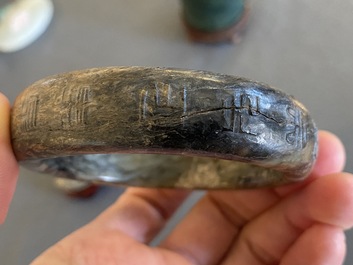 A Chinese jade brush pot, a bangle and two carvings, 19/20th C.