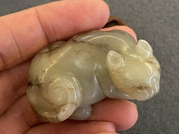 Four Chinese jade carvings with cats, a buffalo and a carp, Qing