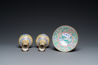 A pair of Chinese yellow-ground Canton enamel vases and a bowl, Yongzheng/Qianlong