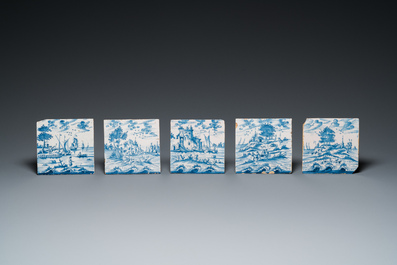 25 blue and white Dutch Delft tiles with continuous landscape scenes, 18th C.