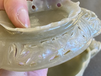 A Chinese reticulated jade bowl and cover, 19/20th C.