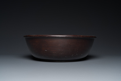 A large Chinese Fuzhou or Foochow lacquer 'tiger' bowl, inscribed 'xin qi chun', 19/20th C.