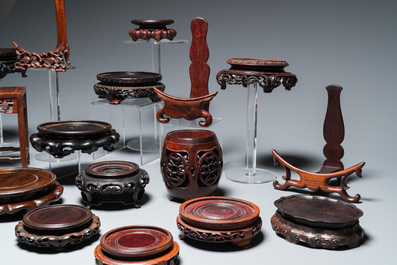 25 Chinese wooden stands, 19/20th C.