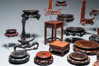 25 Chinese wooden stands, 19/20th C.