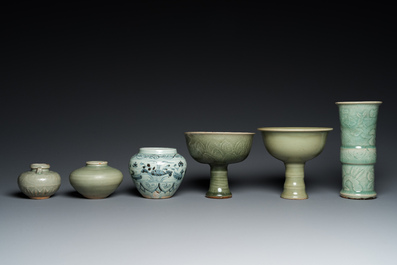 Three Chinese celadon-glazed vases, two stem cups and a blue and white vase, Ming